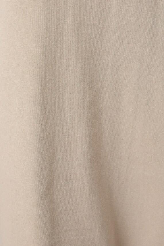 Detailed close-up of the taupe Round Neck Lace Joined T-Shirt Maxi Dress highlighting the contrast between smooth bodice fabric and sheer lace texture.