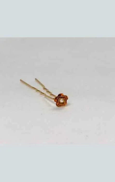 Gold hairpin with a rose flower design and pearl accent on white background, Love Classic