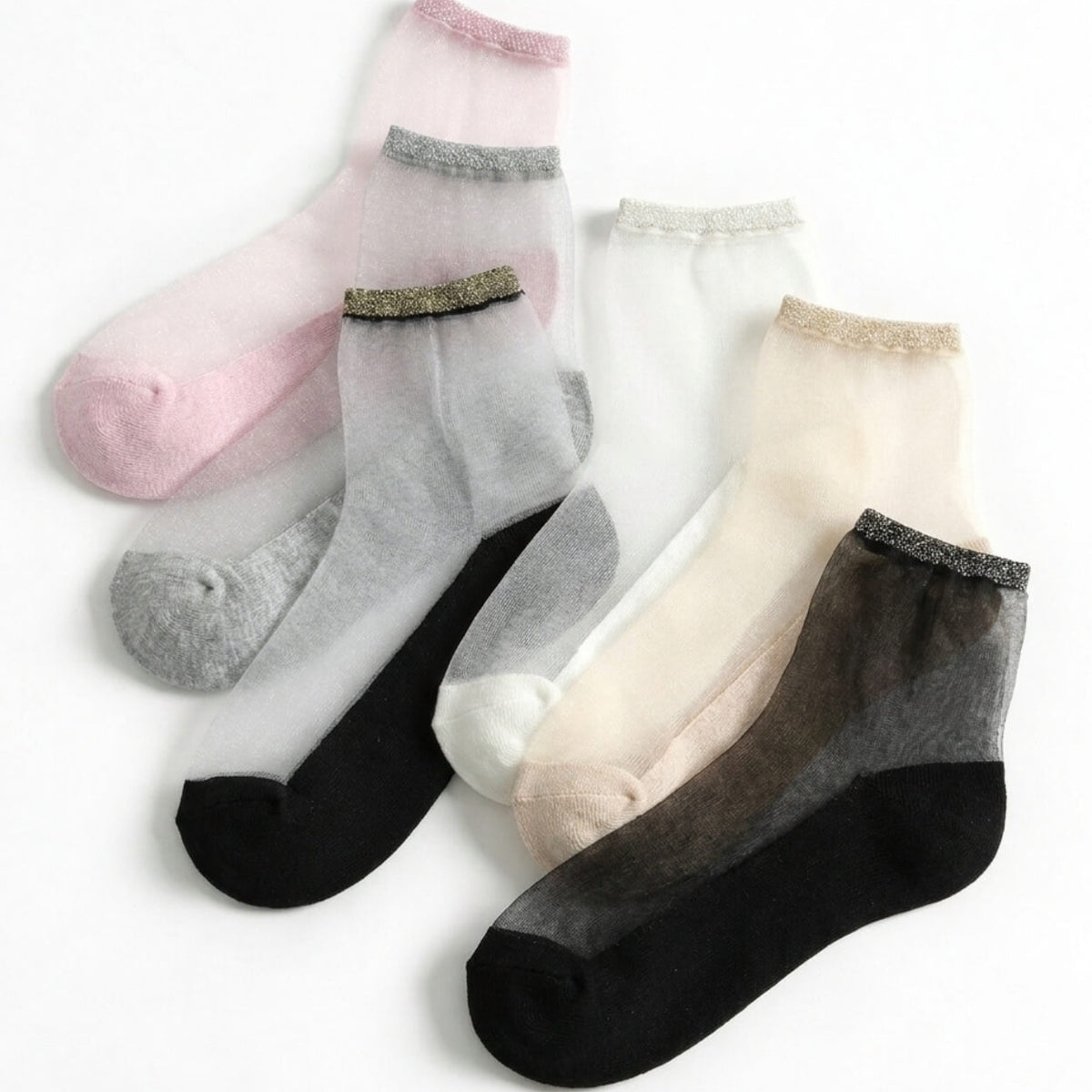 6-Pack Glitter Rim Sheer Crew Socks featuring transparent mesh fabric with soft stretch comfort and shimmering metallic cuffs, displayed in assorted pink, gray, white, beige, and black colorways on a clean white background, highlighting lightweight elegance and versatile everyday styling.