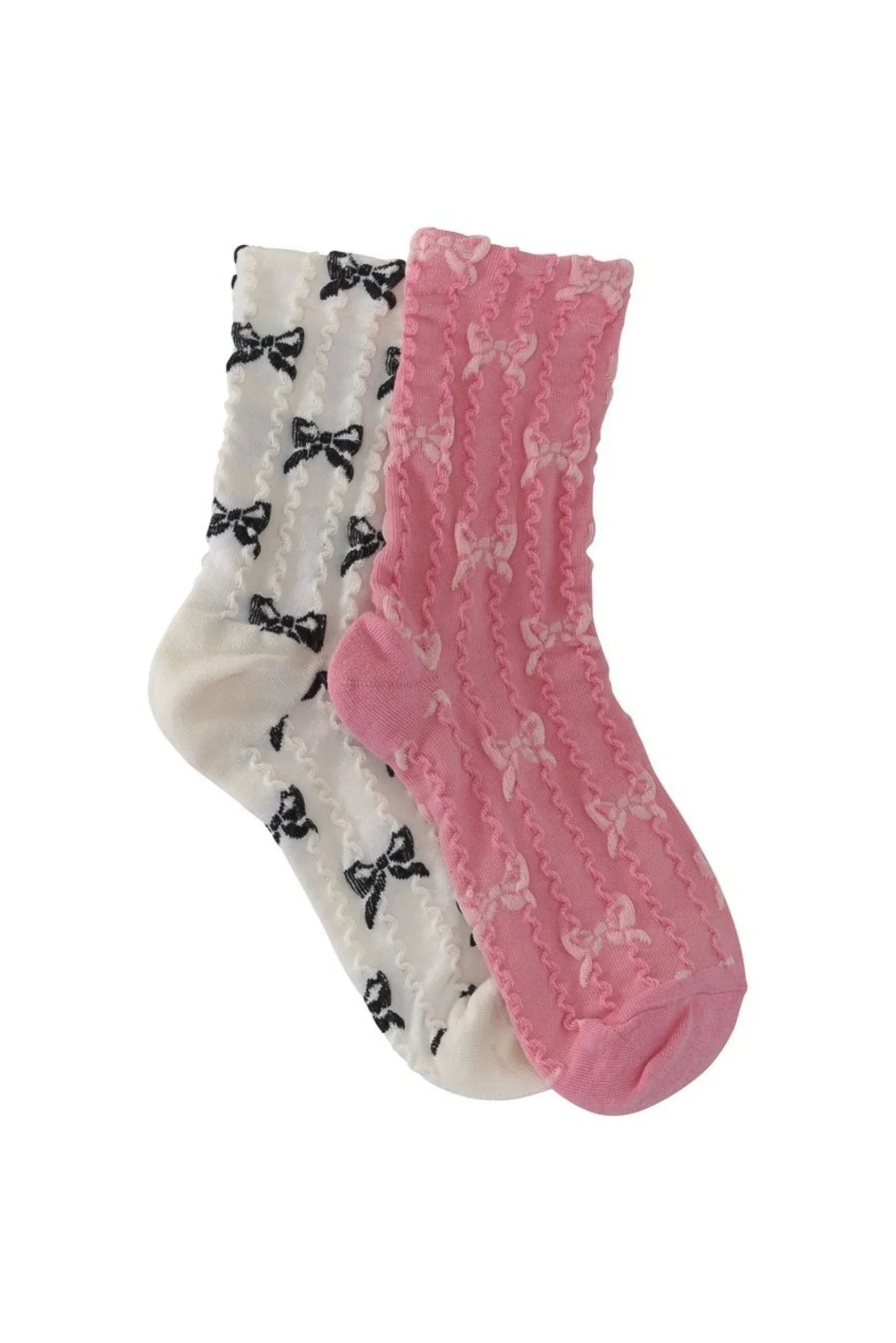 Pair of Love Classic frilly socks, one pink with white bows, one white with black bows