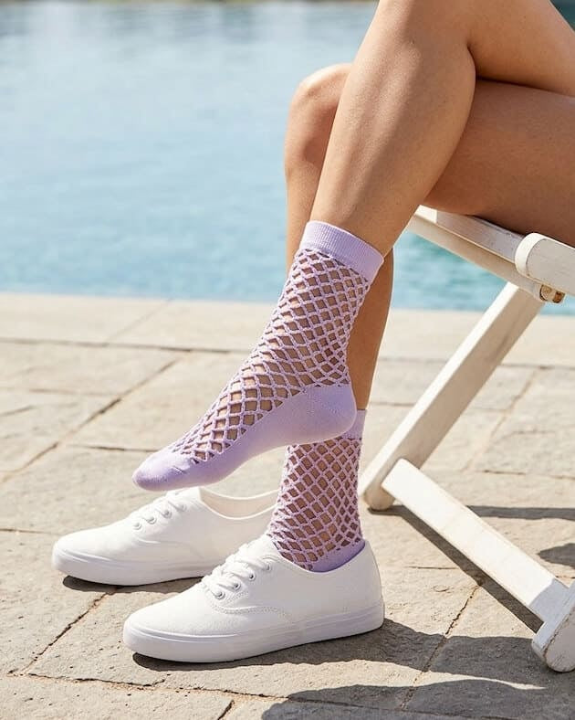 Bundled Pack, Midnight Lattice Fishnet Socks featuring breathable open mesh construction with a flexible crew fit and soft stretch comfort, worn in a lavender color variation beside a poolside setting with casual sneakers, highlighting lightweight comfort and relaxed seasonal styling.