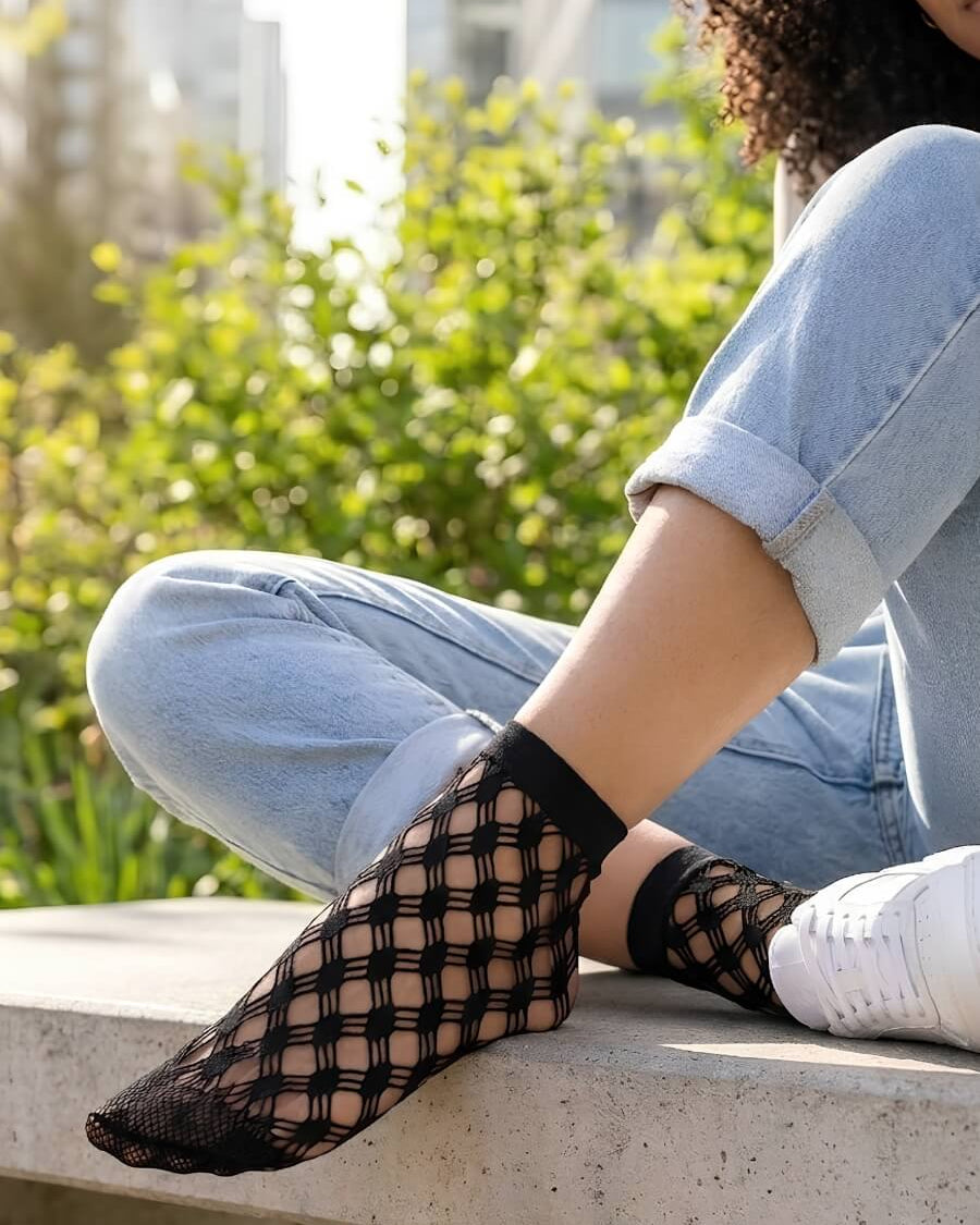Honeycomb Lace Fishnet Socks featuring a bold honeycomb fishnet structure with comfortable ankle coverage, styled with rolled jeans and sneakers on outdoor steps to showcase lightweight texture and casual versatility.
