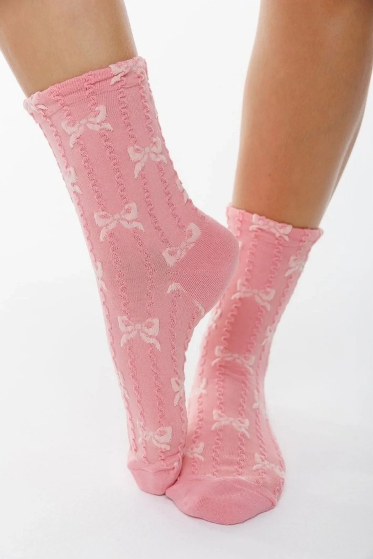 Pink socks with white bow pattern, stylish women's footwear from Love Classic