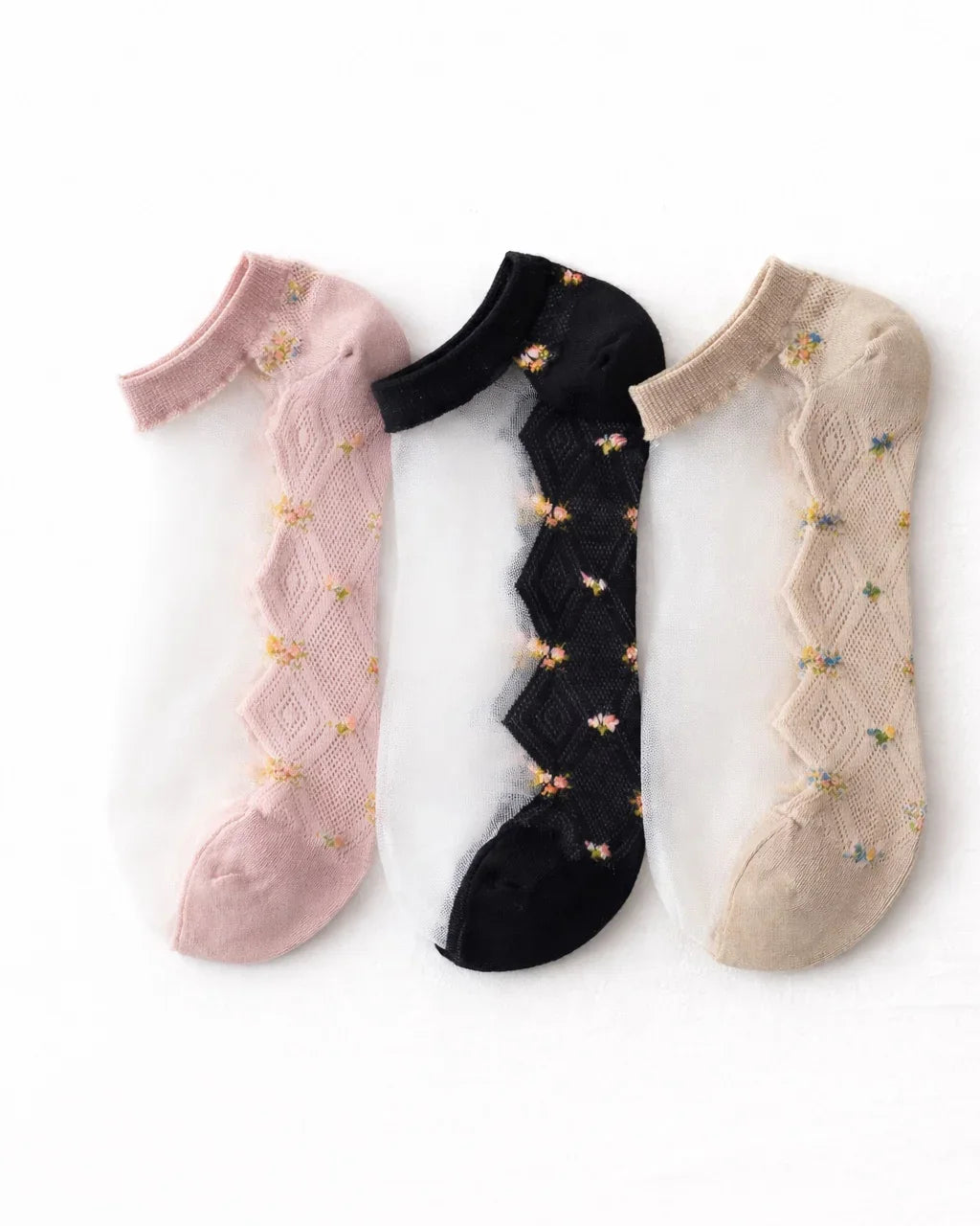 3-pack low rise mesh socks in pink, black, and beige with braided floral pattern