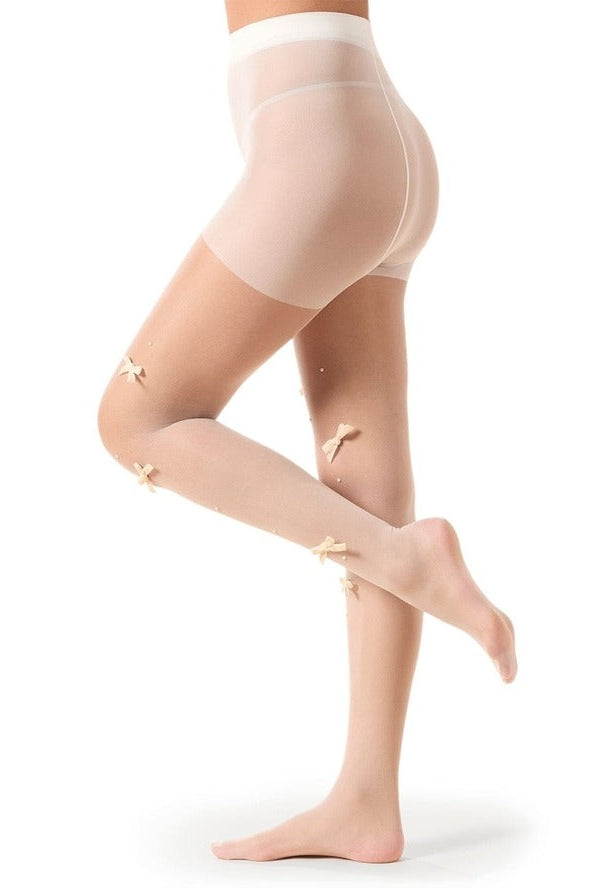 Sheer ivory women’s tights with decorative bow details, high-waist pantyhose worn on legs, elegant fashion hosiery for formal or party wear.