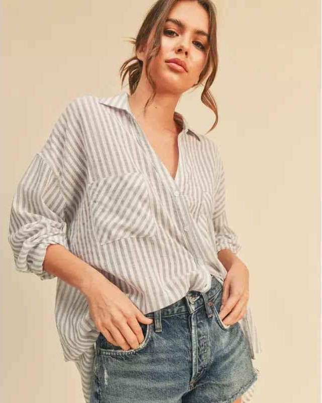 Woman wearing striped button-up shirt and denim shorts, Love Classic casual style