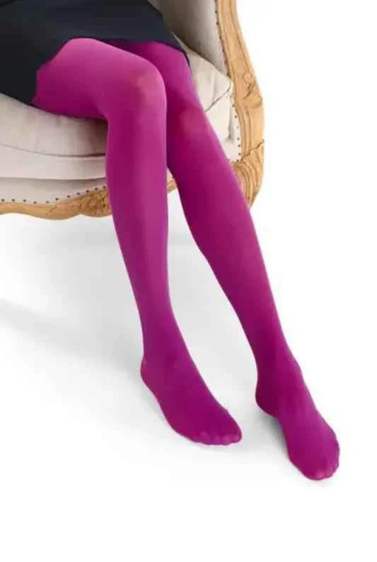 Woman wearing vibrant purple tights sitting on elegant armchair, Love Classic fashion