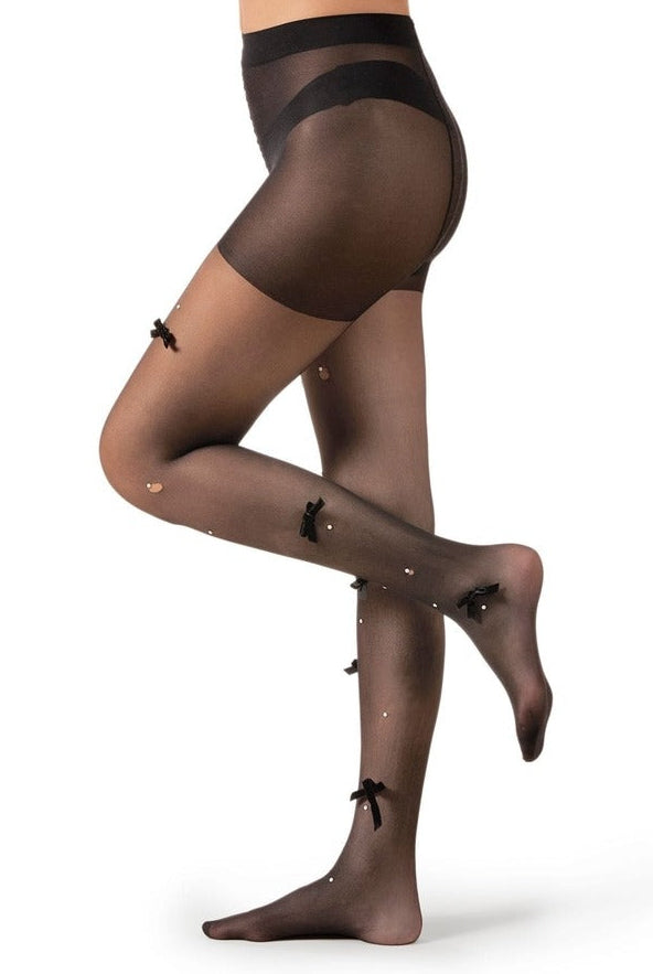 Sheer black women’s tights with decorative bow details, high-waist pantyhose worn on legs, elegant fashion hosiery for formal or party wear.