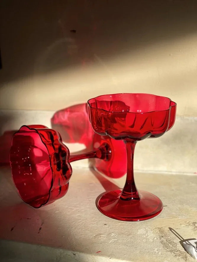 Two red vintage-style glass goblets on a light surface in sunlight, Love Classic home decor