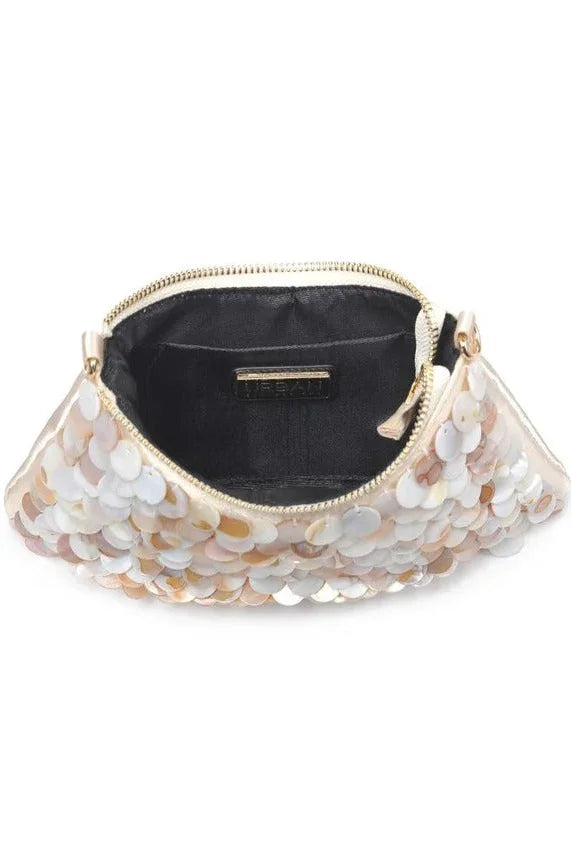 Elegant opalite evening bag with an ethereal, light-catching glow and sleek silhouette, perfect for refined evening and date night looks.