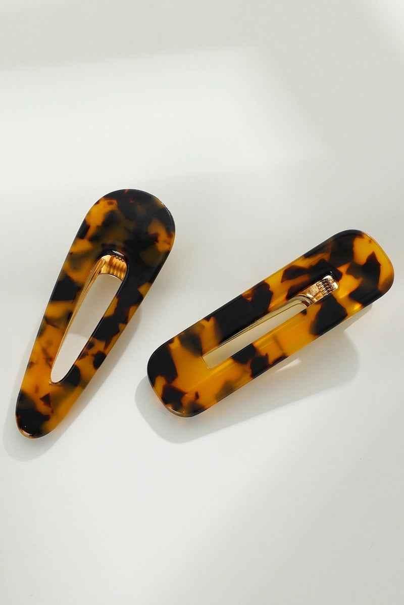 Pair of tortoiseshell hair clips on white background, Love Classic high quality accessories