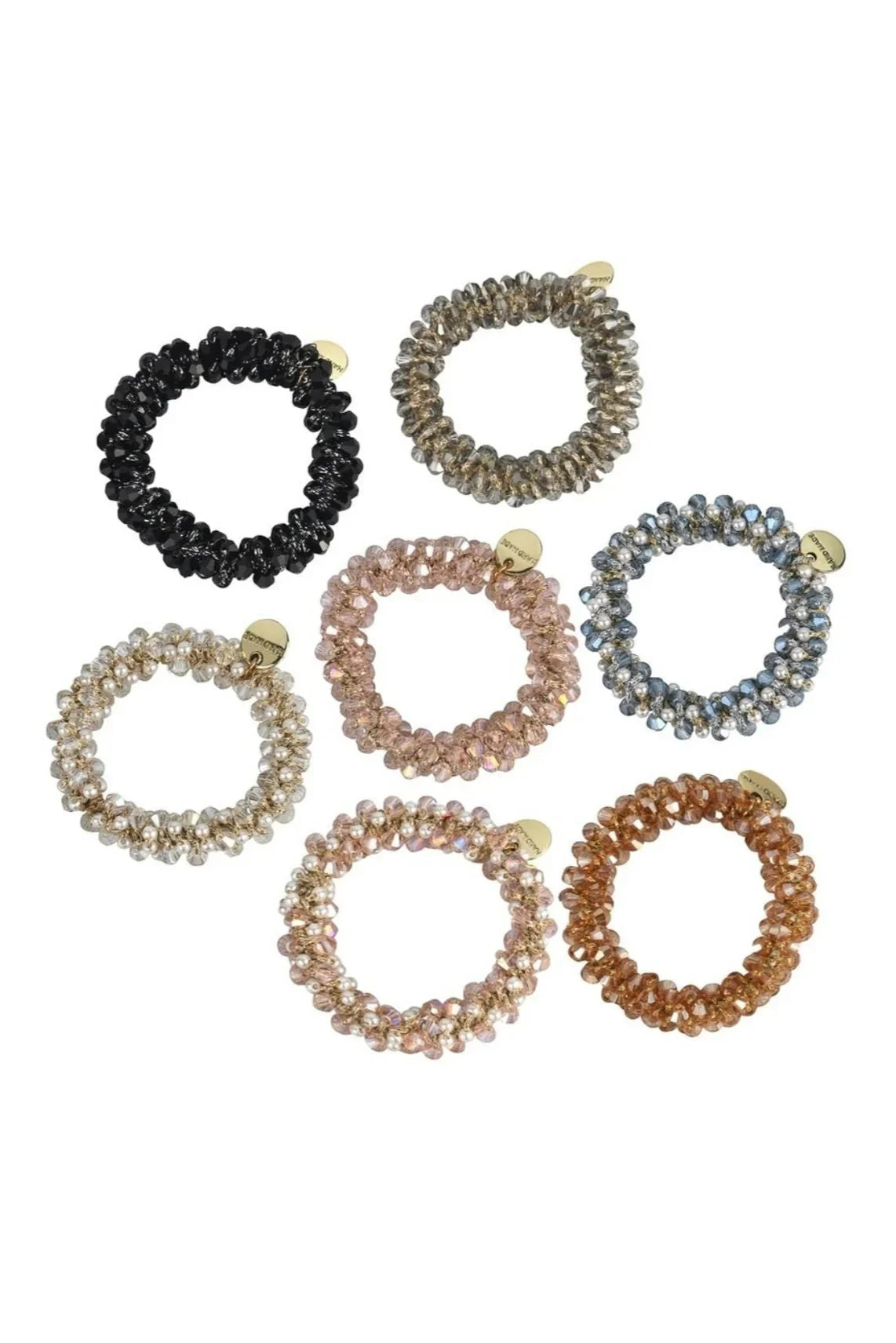 Assorted crystal beaded hair ties with gold tags from Love Classic, displayed on white background