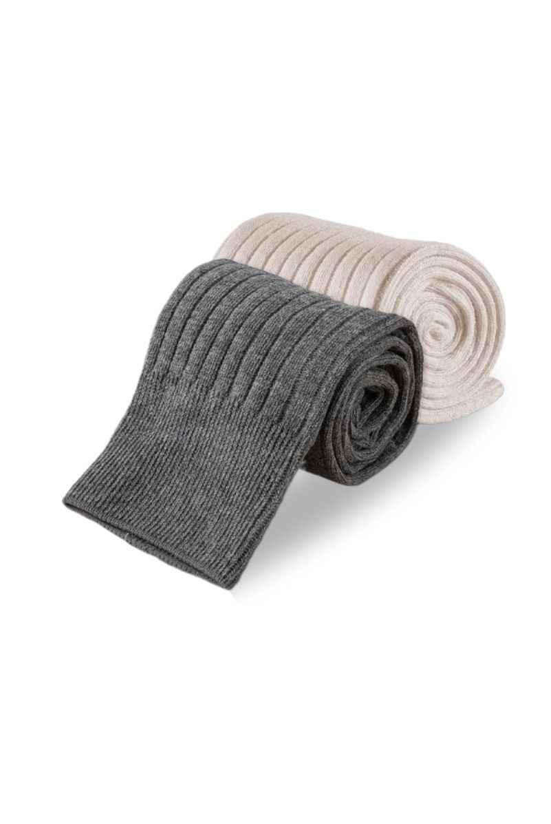 Two ribbed knit scarves in gray and beige from Love Classic, displayed rolled up.
