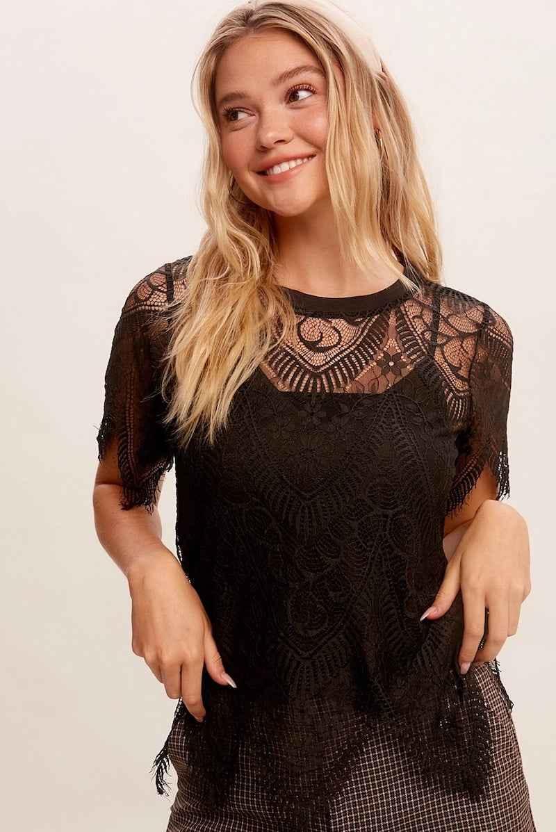 Woman wearing stylish black lace blouse from Love Classic, high quality fashion style