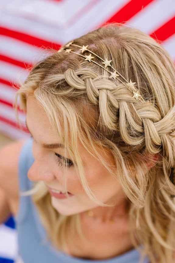 Blonde woman with star headband and braided hairstyle, Love Classic accessory style