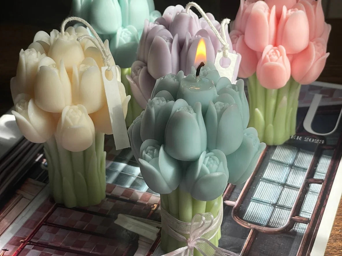 Pastel tulip-shaped decorative candles in various colors on a magazine, Love Classic style