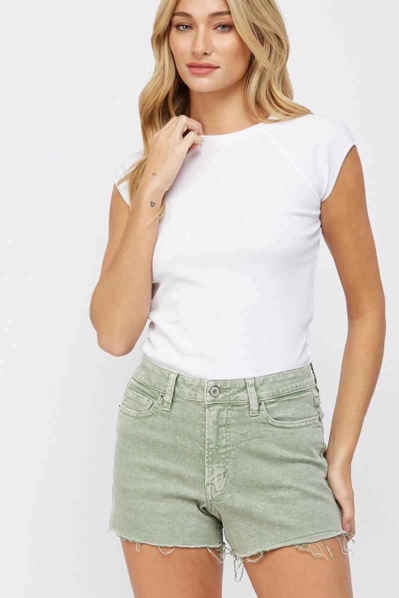 Woman in sage green denim shorts and white tee, Love Classic high quality casual fashion
