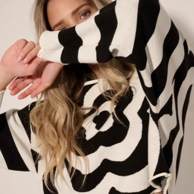 Woman wearing a black and white zebra print sweater, Love Classic high quality fashion