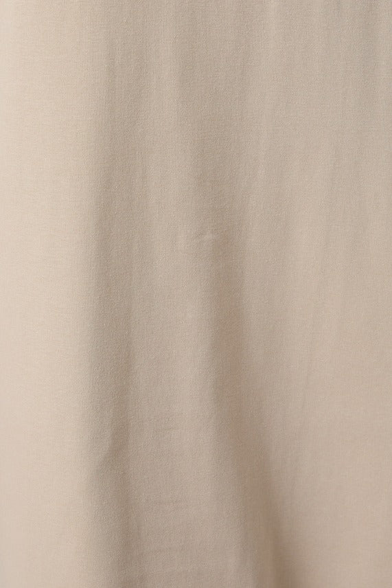 Detailed close-up of the taupe Round Neck Lace Joined T-Shirt Maxi Dress highlighting the contrast between smooth bodice fabric and sheer lace texture.