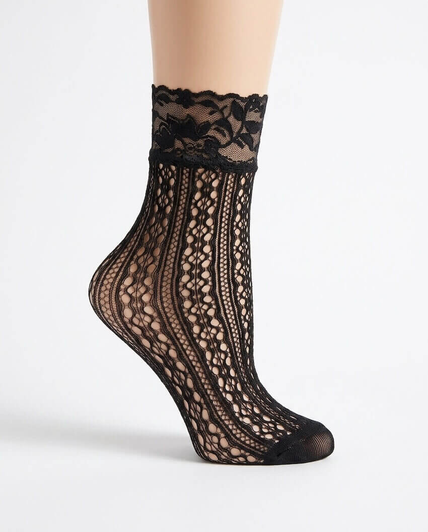 3-Pack Floral Diamond Lace Fishnet Socks featuring an elegant black openwork fishnet design with vertical diamond detailing and a delicate floral lace cuff, worn with white sneakers during an outdoor city stroll, highlighting breathable comfort, lightweight construction, and fashionable everyday styling.