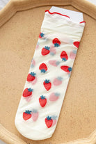 Sheer mesh crew socks with a strawberry pattern and a soft lettuce-edge cuff on a neutral background.