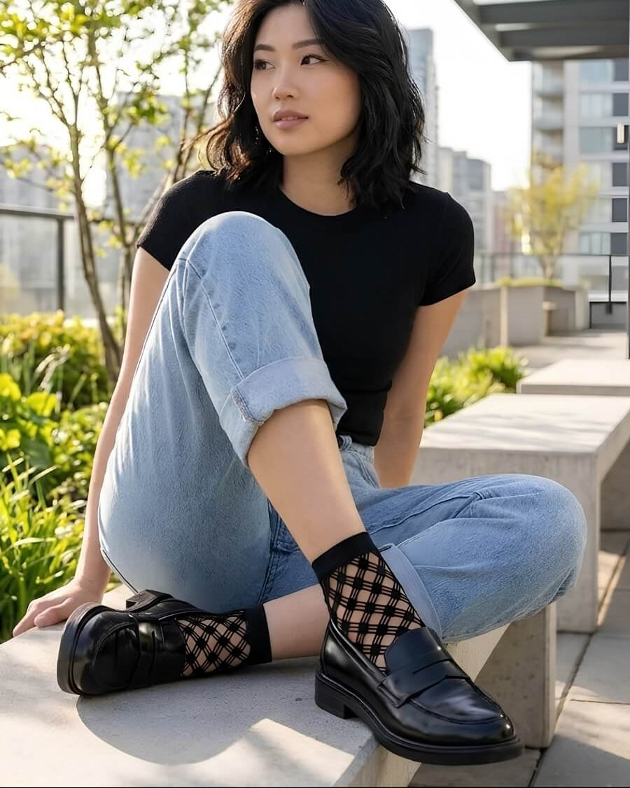 Honeycomb Lace Fishnet Socks featuring a sheer geometric lace pattern with a snug ankle fit, paired with loafers and rolled jeans in a sunny urban setting to emphasize polished styling and distinctive texture.