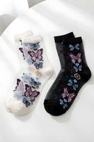 Butterfly Sheer Socks 2-Pack featuring two color options in sheer mesh fabric with detailed butterfly embroidery, displayed flat on a clean white surface.