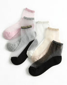 6-Pack Glitter Rim Sheer Crew Socks featuring transparent mesh fabric with soft stretch comfort and shimmering metallic cuffs, displayed in assorted pink, gray, white, beige, and black colorways on a clean white background, highlighting lightweight elegance and versatile everyday styling.