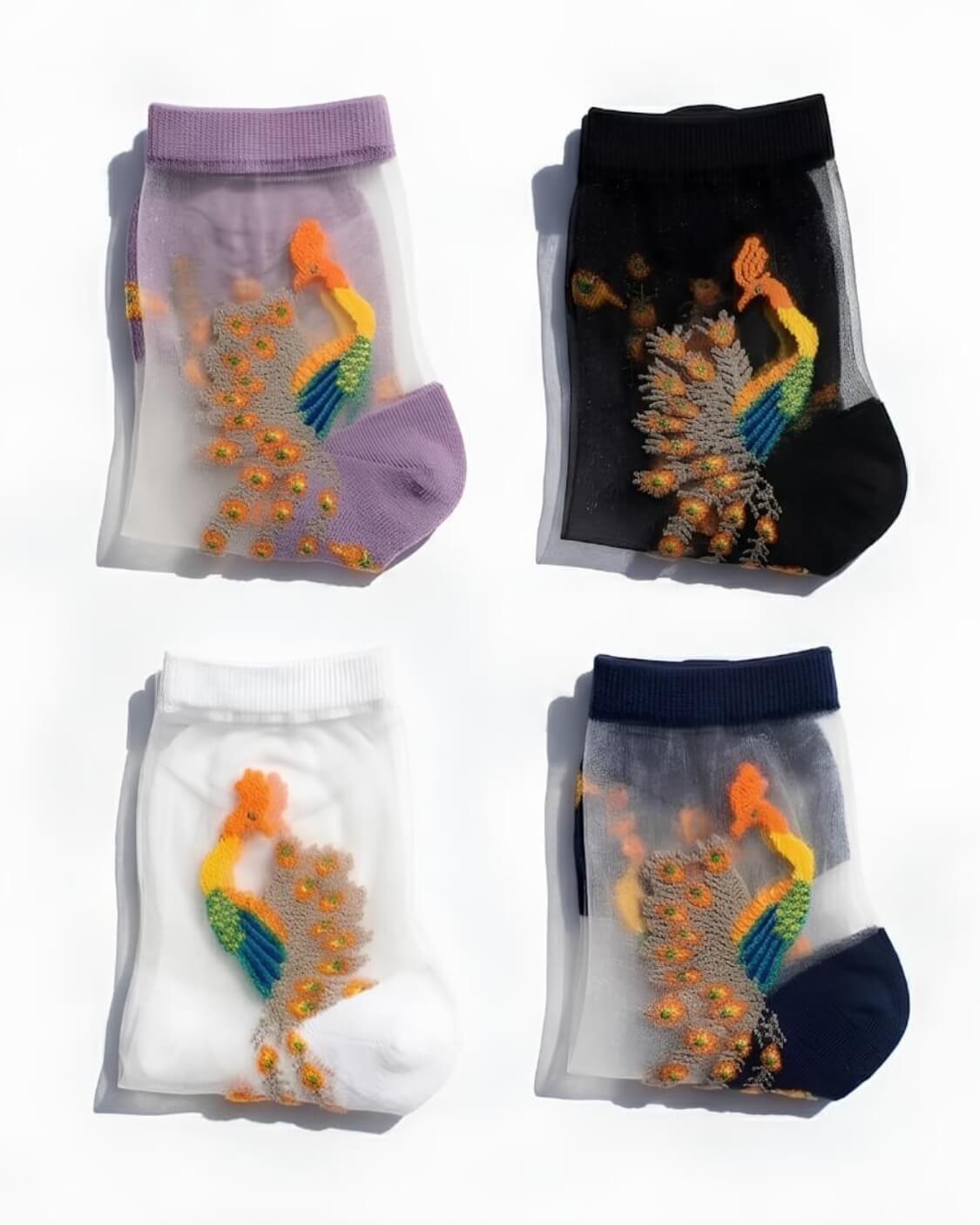 4-Pack Peacock Sheer Mesh Socks featuring transparent mesh fabric with colorful embroidered peacock detailing and soft stretch ankle cuffs, displayed in four assorted colorways on a clean white background, highlighting the lightweight breathable texture and elegant decorative finish.