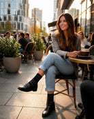 Lace Pattern Sheer Sock featuring sheer black lace pattern socks worn with loafers and rolled jeans at an outdoor café, highlighting everyday styling, breathable comfort, and subtle textured finish.