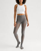 Lightweight Semi Opaque Tights in soft gray, featuring a smooth semi-sheer finish with gentle stretch and high-waisted fit, shown full-length on a model in a clean studio setting.