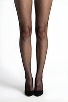 Rhinestone Fishnet Tights featuring close-up view of sheer fishnet tights with scattered rhinestone detailing, worn with pointed heels, highlighting intricate net structure, shimmer accents, and a sleek leg-enhancing finish.