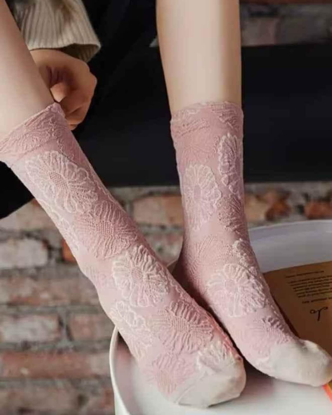 3-Pack Bouquet Flower Crew Sock featuring textured floral detailing with an intricate raised blossom pattern and soft crew length structure, styled beside an open book and tea glass, emphasizing cozy comfort and romantic vintage inspired styling.