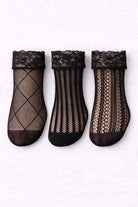 Three black lace fishnet ankle socks with floral lace cuffs displayed flat, featuring diamond, vertical stripe, and intricate lace patterns.