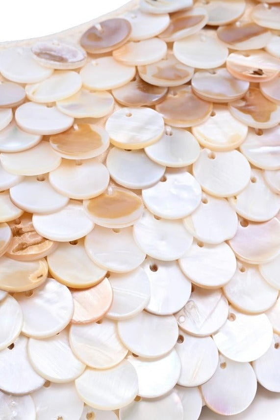 Small opalite evening bag showcasing a radiant, iridescent finish and sophisticated styling that adds celestial sparkle to formal outfits.