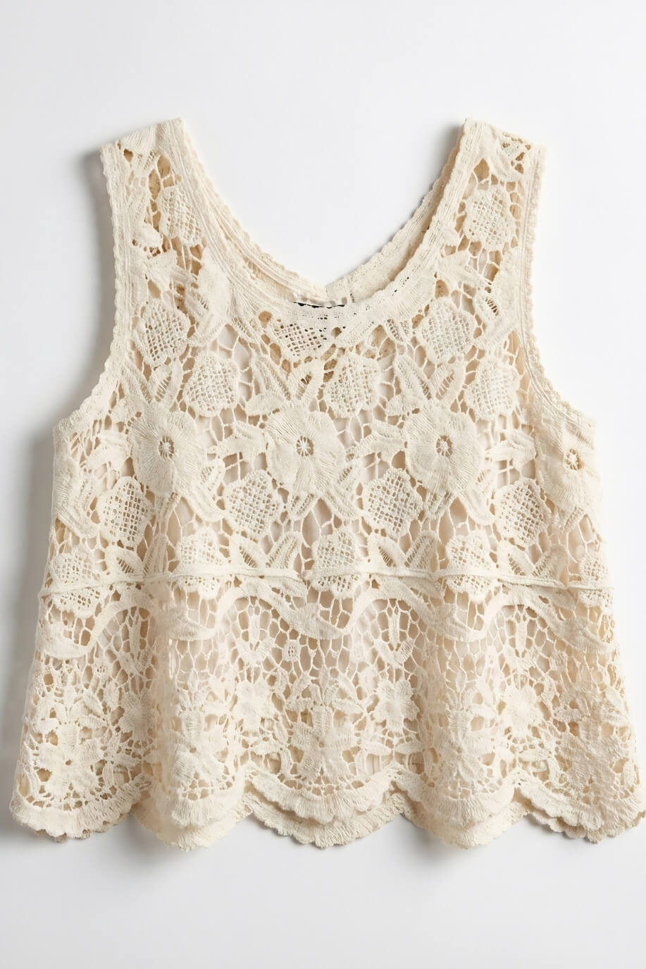 Crochet Lace Tank Top featuring a cream floral crochet lace design with intricate openwork pattern and scalloped hem, shown laid flat against a neutral background, product-only view.