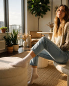 Lace Pattern Sheer Sock featuring sheer white lace pattern socks worn in a bright indoor setting with relaxed posture, highlighting soft texture, breathable knit, and ankle-length fit.