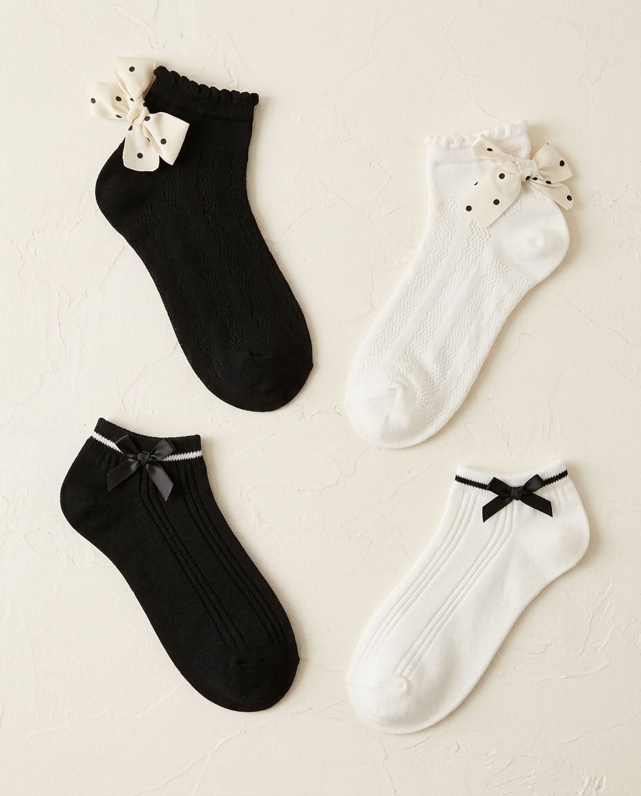 4-Pack Satin & Polka Dot Bow Ankle Socks flat lay: black and white socks with polka dot bows and black satin bows