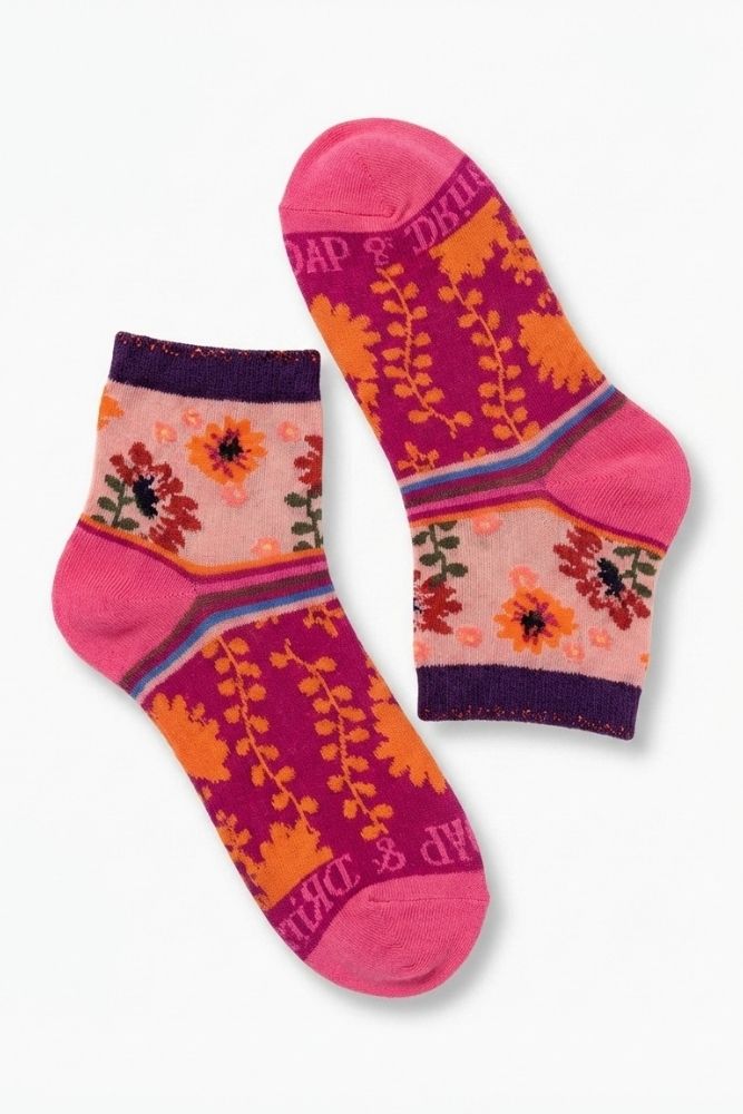 Shine Ultra-Short Ankle Socks featuring a soft stretch knit with colorful floral design, contrast cuff, and bright toe detail, displayed flat on a clean background, highlighting pattern detail and low-profile construction.