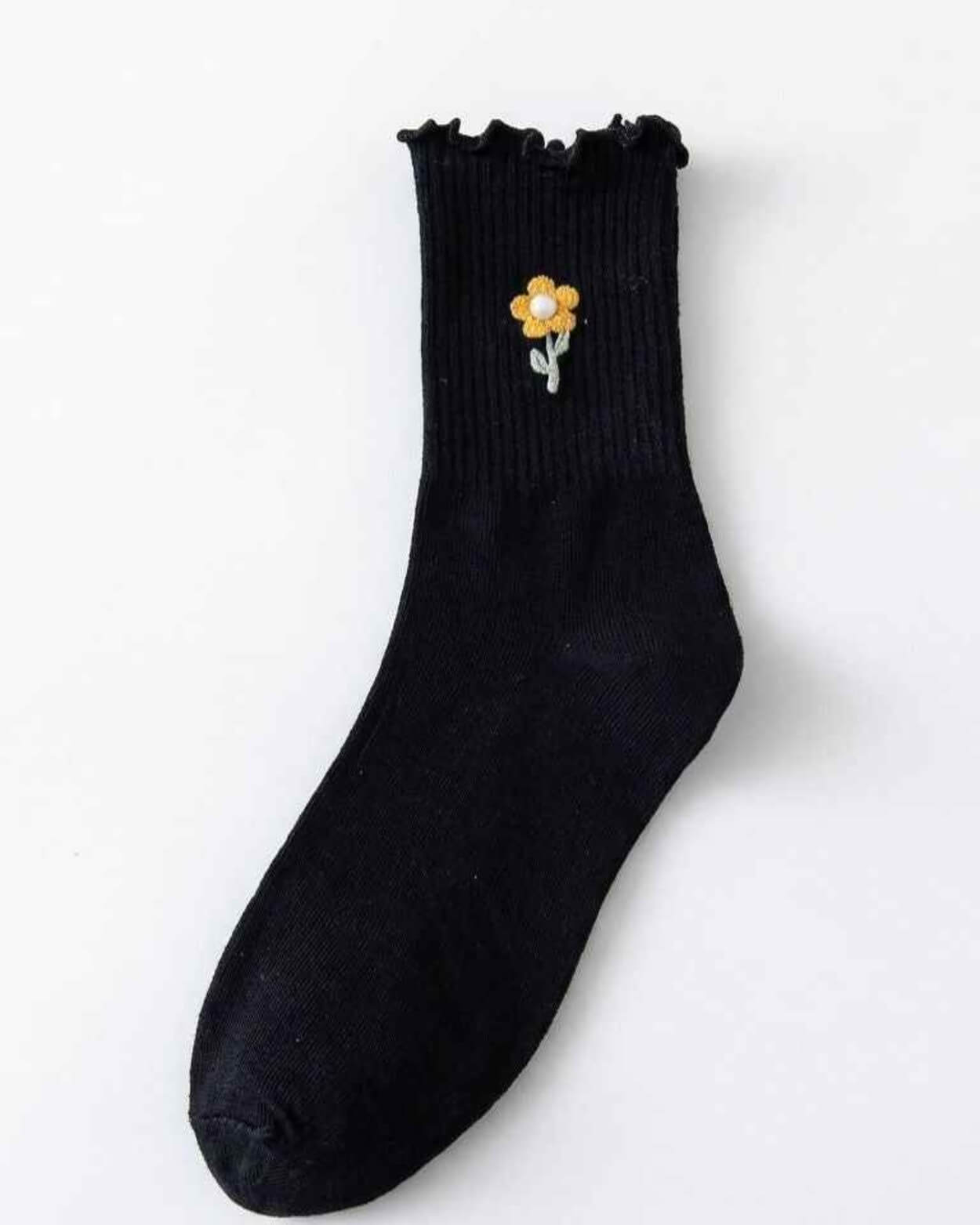 3-Pack Blush Pearl Rose Ruffle Crew Socks featuring a ribbed crew sock with a ruffled cuff and small flower embroidery near the ankle, displayed flat against a clean studio background, highlighting soft stretch, everyday comfort, and charming casual styling.