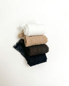 Bundled Packs Rosalie Lace Sheer Socks featuring raised wavy lace texture and delicate ruffled top edges, arranged in a clean stacked bundle with multiple rolled pairs, highlighting the sheer finish, compact storage and assorted pack styling.