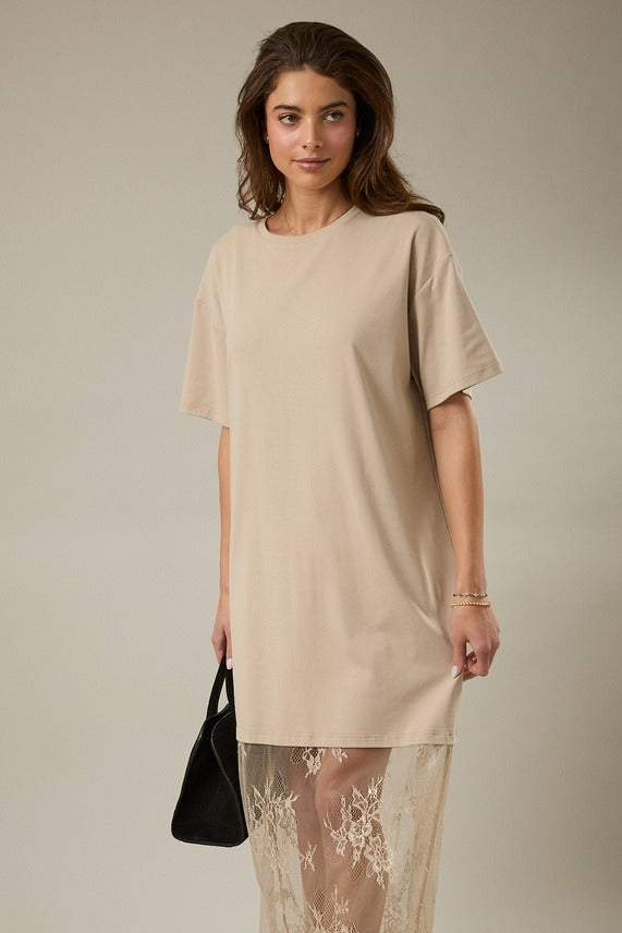 Model showcasing the taupe Round Neck Lace Joined T-Shirt Maxi Dress combining relaxed t-shirt comfort with romantic lace accents and full-length skirt.