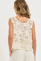 Crochet Lace Tank Top featuring a cream floral crochet lace design with scalloped hem, shown from the back on a model highlighting the lace pattern and cut, studio rear view.