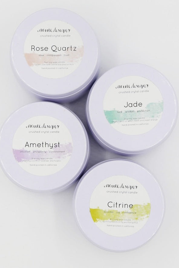 Love Classic collection of crushed crystal candles in Rose Quartz, Jade, Amethyst, and Citrine tins