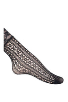 Black vertical floral lace mesh ankle socks with a scalloped lace cuff, shown on a model against a light background.