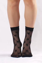 Stylish black mesh crew socks with star design for women