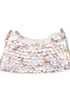 Opalite evening bag with iridescent color-shifting finish, compact elegant clutch design, and luminous shimmer for weddings, galas, and formal events.